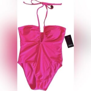 One piece halter style swimsuit with plunging v neck. NWT. Size Large
